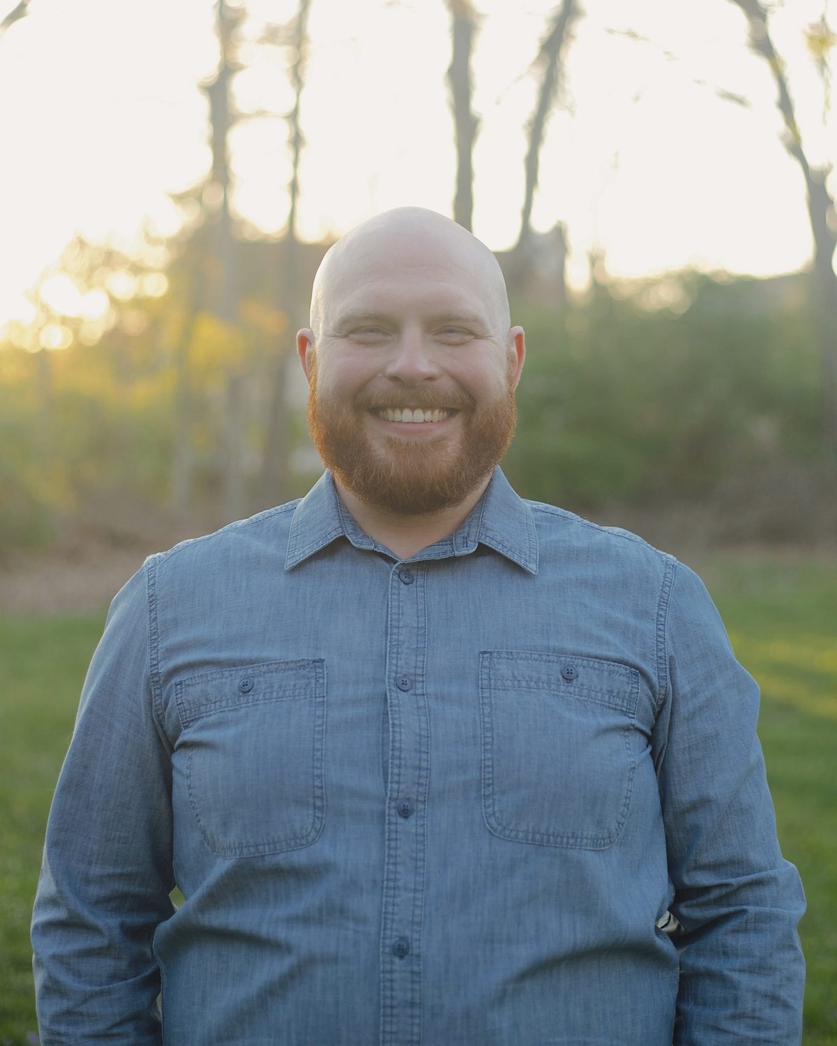 Thomas Burris, founder of Simple IT, smiling outdoors